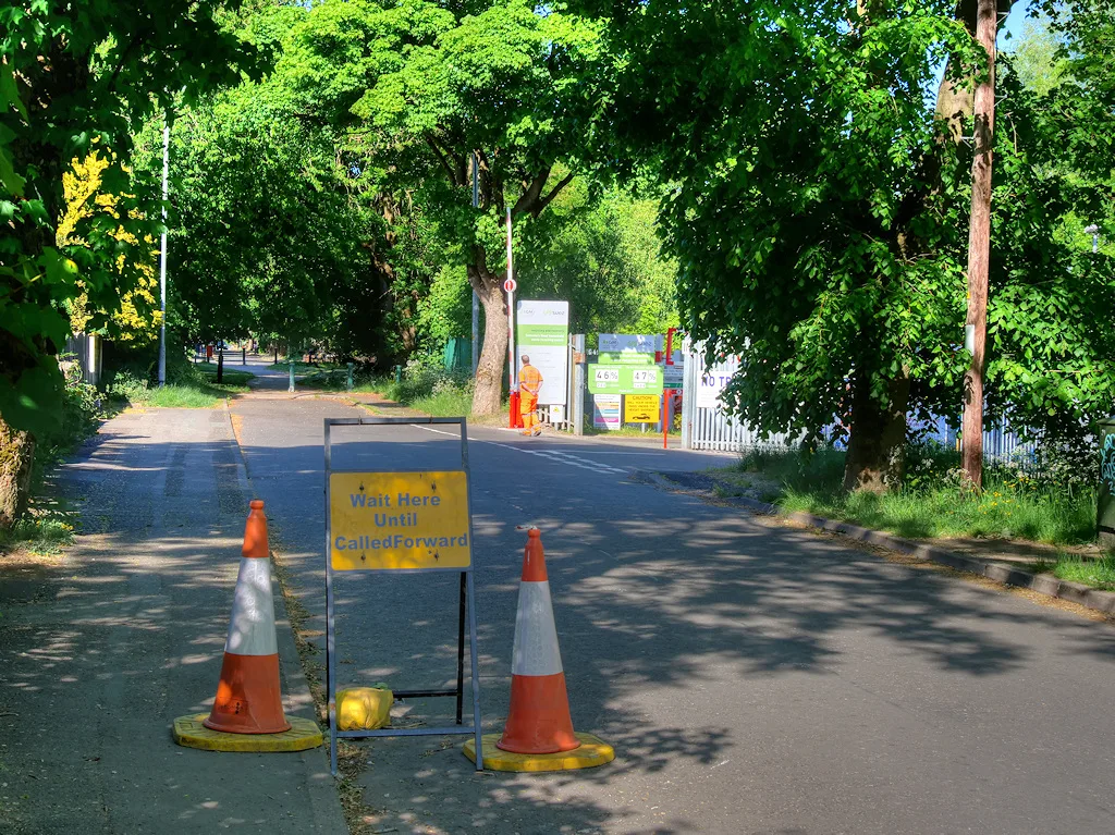 The approach to the Radcliffe recycling centre on Cemetery Road, one of the borough's two tips. Photographed in May 2020, when only one vehicle at a time was let in.