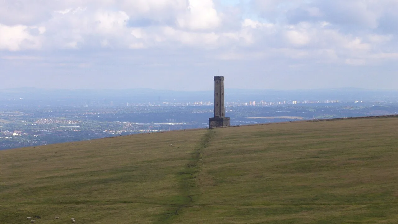 Peel Monument on Holcombe Hill, seen from Harcles Hill with Greater Manchester beyond